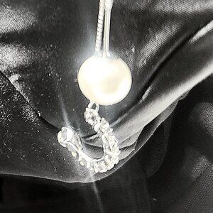 Sterling silver and rhinestone dangler earrings